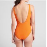 Athleta 🌱 Orange One piece Swimsuit Size M Photo 1