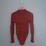 Free People NWT  Orange Pointelle Me About It Bodysuit Size Medium Photo 3