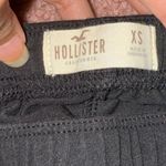 Hollister  Black Leggings with White and Yellow Accents Photo 1