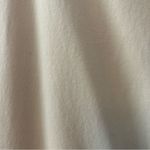 CAbi light yellow embellished flower v-neck raw hem top size XS Photo 9