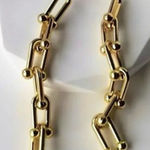 Anthropologie 18K link horseshoe earrings Photo 0