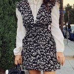 The East Order Floral Side Tie Mini Dress Photo 0