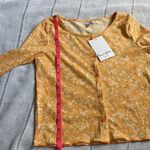 Love, Fire NWT  cropped cardigan and tank set in orange sherbet with ditsy print. Photo 10