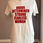 Forever 21 Brave Determined Strong Fearless Woman white T shirt with red letters Photo 0