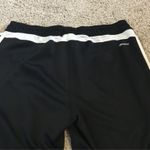 Adidas  black and white joggers woman’s size small Photo 1