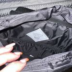 Herschel Supply Company Herschel Retreat Sling bag NWT
Black winter plaid Photo 3