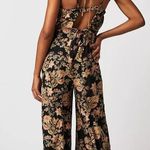 Free People large Stand Out Printed One-Piece oversized floral jumpsuit Photo 0