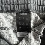 Adidas Women's Athletic Shorts in Dark Gray with Pink Accents Photo 2