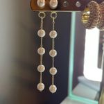 Francesca's  Dangling pearl Earrings Photo 0