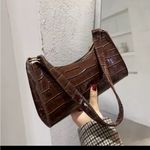 Elegant Brown Crocodile Photo 1