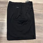 IZOD Mens straight golf shorts are a size 36. Photo 3