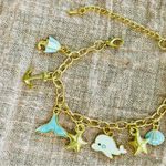 Gold Nautical Charm Bracelet Photo 2