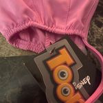 Cherokee Tooniforms Disney Love happens unisex scrub hat Photo 8