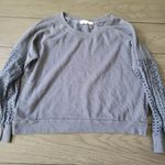 Hippie Rose  cropped sweatshirt with eyelet details on sleeves.  M Photo 0