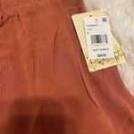 Macy's NWT Pom Pom shorts. Size Medium. Orange. Photo 2