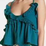 Romeo + Juliet Couture  turquoise ruffled crop top with lace up back / M … Photo 0