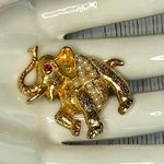 Vintage Gold Tone Elephant Brooch โ Trunk Up, Pearl Saddle, Red Stone Eye, 1.25โ Photo 1