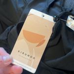 KIRUNDO black short sleeve tiered loose fitting dress | large Photo 3