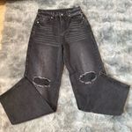 Bagguie Black Flare Wide Leg Jeans with Distressed Knees Photo 0