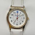 Nurse Mates  women’s gold toned watch 32mm case size white leather band running Photo 0