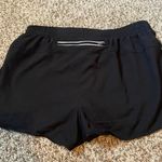 ASICS black shorts Photo 2