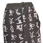 Indero brand black stick men design joggers! Size undefined Photo 1