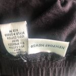 Hemline Black strapless dress with draped . Photo 44