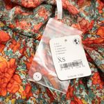 Free People . Loretta Floral Oversized Top. Photo 6