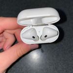 Apple AirPods And Charging Case Photo 2