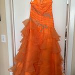 Orange halter formal dress ruffle skirt Size none Photo 1