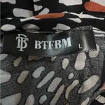 BTFBM Black and White Patterned Mini Dress with Specks of Burnt Orange. Size L Photo 3