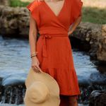 Boutique orange wrap dress Photo 0