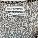 Urban Outfitters  | Cheetah Twist Front Crop Top Photo 2