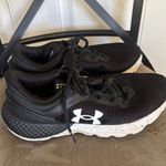 Under Armour Size 6.5 Black White Charged Escape lace up sneakers Photo 1