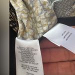 Nine West Snakeskin print fitted dress with a V-neckline and buckle details at the waist. Photo 6