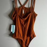 Abound NWT  rust colored body suit size small Photo 3