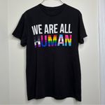 Spencer’s We are all Human Pride T Shirt Unisex Size Medium Black LGBTQ Photo 1