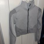 Women’s Bella Movement zip up long sleeve jacket Medium Gray Photo 1