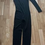 Area black asymmetrical jumpsuit with crystal embellishment Photo 3