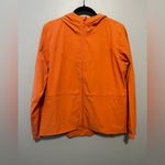 Lululemon Athletica Orange Raincoat with Hood and Water-Resistant Fabric Photo 1