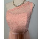 David's Bridal David’s bridal bridesmaid dress size 8 color is pink orange long with a slit Photo 1