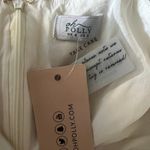 Oh Polly NWT  Corset Mini Dress Size 2 Ivory Puff Sleeve Smocked Ruffle Milkmaid Photo 5