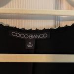 Coco Bianco  sleeveless, black sheath dress with gold chain detail Photo 5