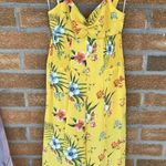 Likely  yellow floral jumpsuit size 10 Photo 1