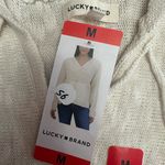 Lucky Brand  NWT Baja Sweater hoodie cream
Color sz M, 21” p2p Photo 6