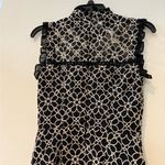 Monique Lhuillier ML
Ivory Lace Sheath Photo 7