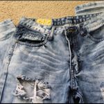 Machine dark acid wash ripped straight leg jeans Blue Size 27 Photo 3
