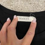 Roolee Black scoop neck shirt size small. Photo 2