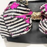 Betsey Johnson  Black Striped Big Sequin Bow Multi Pocket Handbag Photo 1