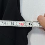 Women’s Sleeveless Black Vneck ruched dress with front slit size Large Photo 7